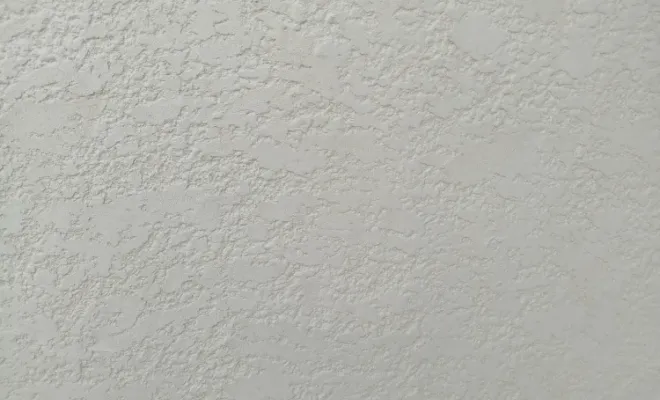 Ravalement d'une façade sur mur de clôture pisé à Rochetoirin, Bourgoin-Jallieu, KS Maçonnerie